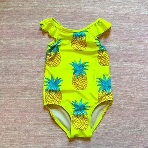 Tea Collection girl’s 4T pineapple one-piece swimsuit.